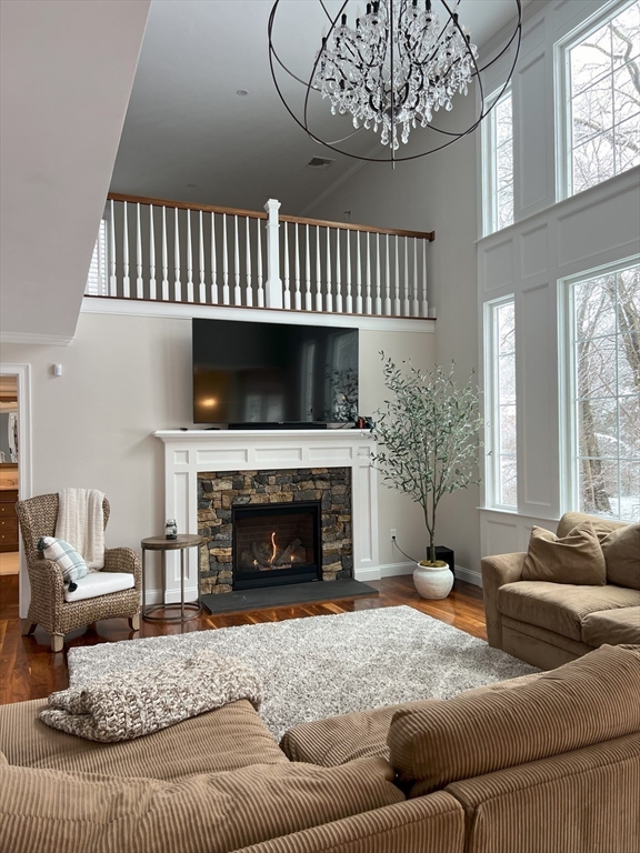 69 Narrows Road Assonet, MA 02702 - Photo 5 of 40 a living room with furniture and a fireplace
