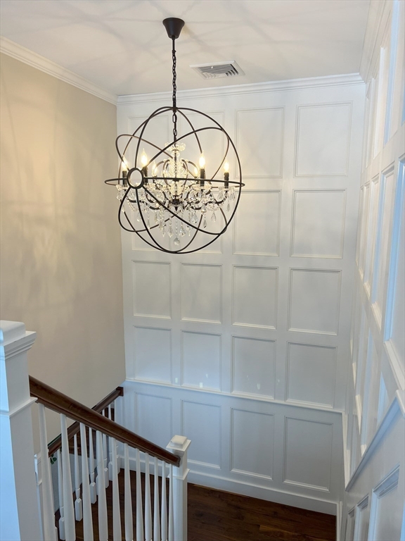 69 Narrows Road Assonet, MA 02702 - Photo 7 of 40 a view of a hallway with a chandelier fan