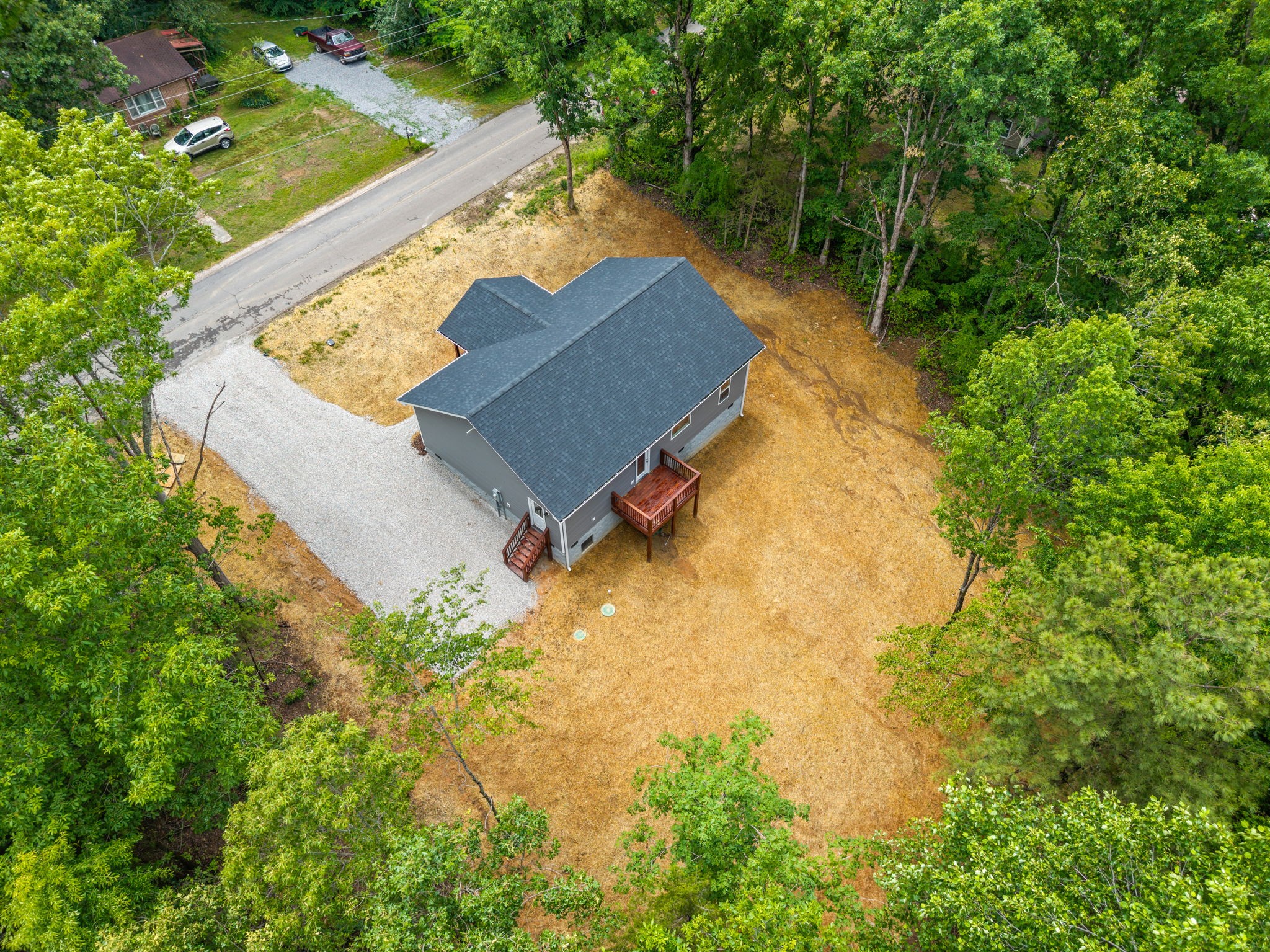 690 Brazzle Road Waverly, TN 37185 - Photo 32 of 35 an aerial view of a house with a yard and lake view