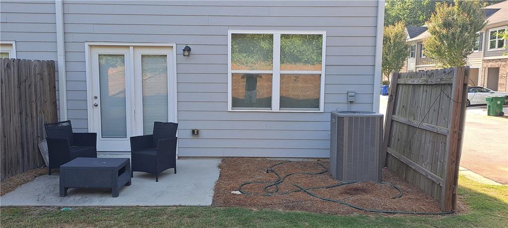 1683 Vernon Boulevard Decatur, GA 30035 - Photo 3 of 14 a view of house with backyard and outdoor seating