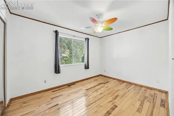 a view of a livingroom with wooden floor