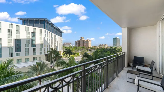 a view of balcony with furniture