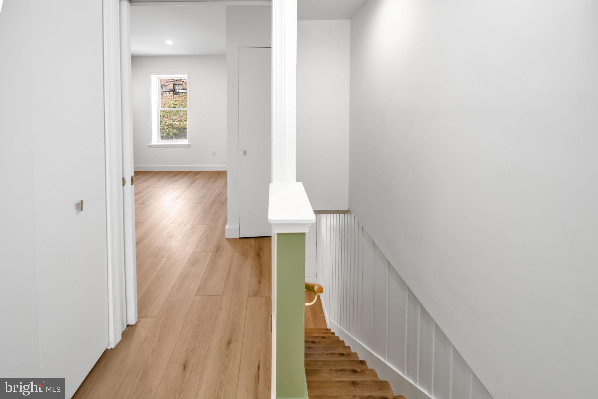 1845 Corcoran Street Northeast Washington, DC 20002 - Photo 13 of 33 Bright and airy hallway with charm.