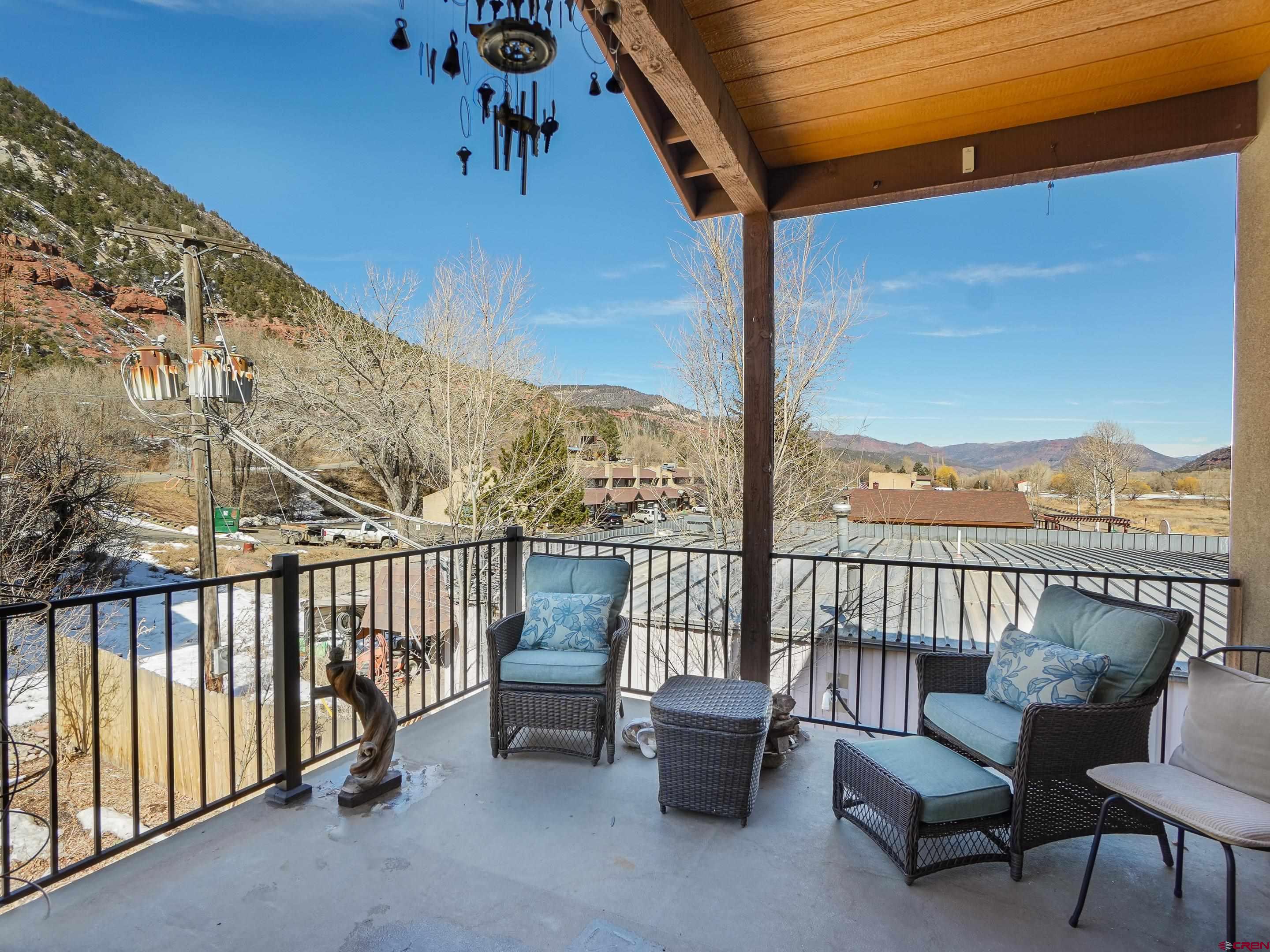 1422 Animas View Drive, Unit 18 Durango, CO 81301 - Photo 16 of 16 a view of a chairs and table in the balcony