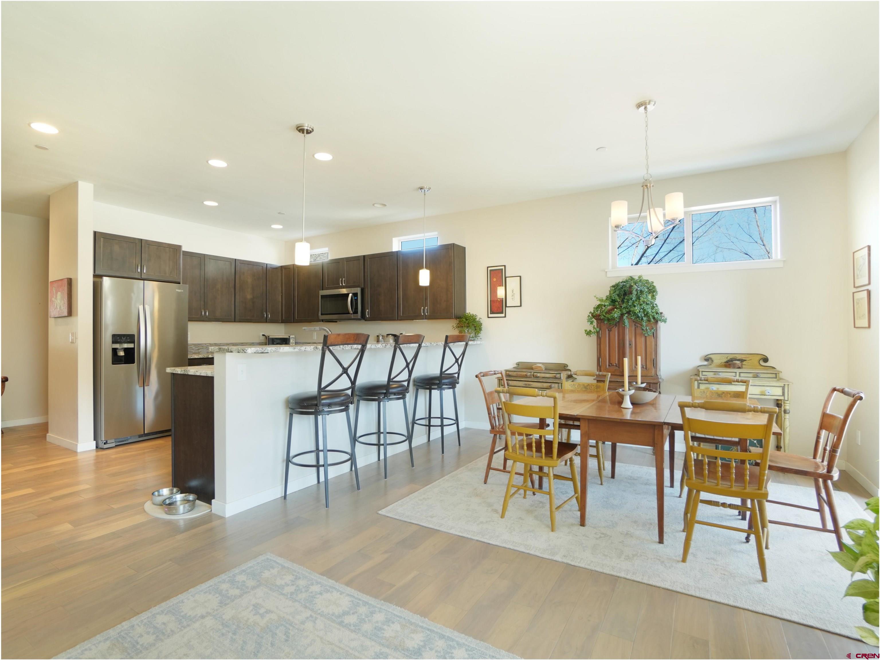 1422 Animas View Drive, Unit 18 Durango, CO 81301 - Photo 4 of 16 a view of a dining room with furniture