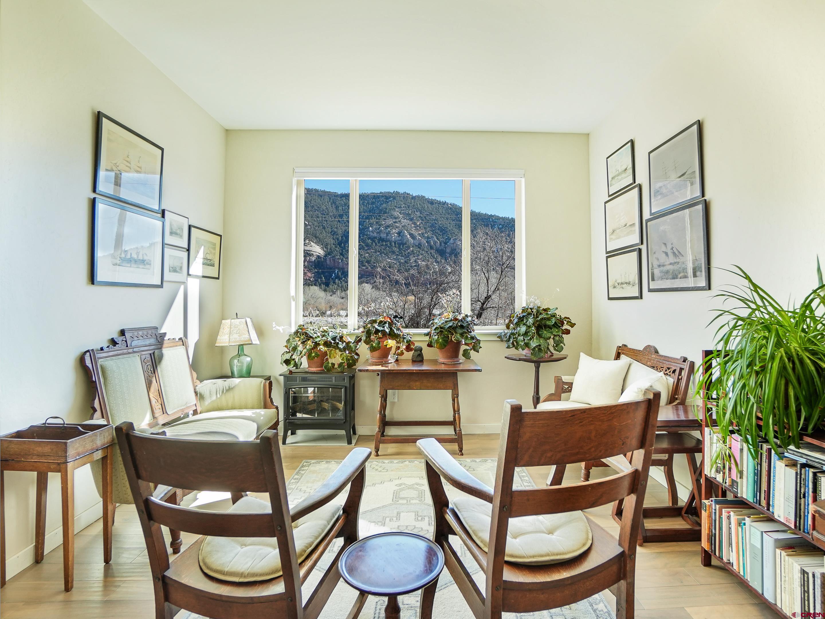 1422 Animas View Drive, Unit 18 Durango, CO 81301 - Photo 6 of 16 a dining room with furniture and wooden floor