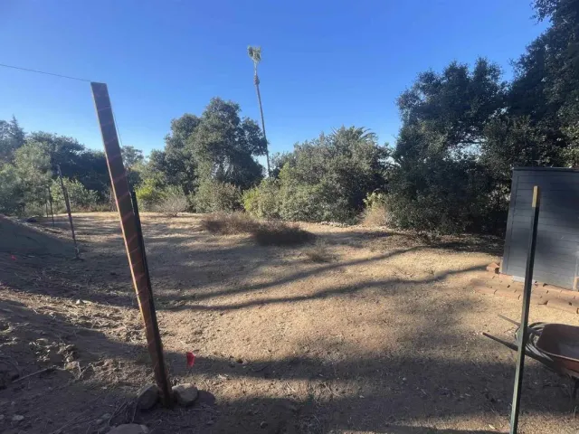 a view of a backyard of a house