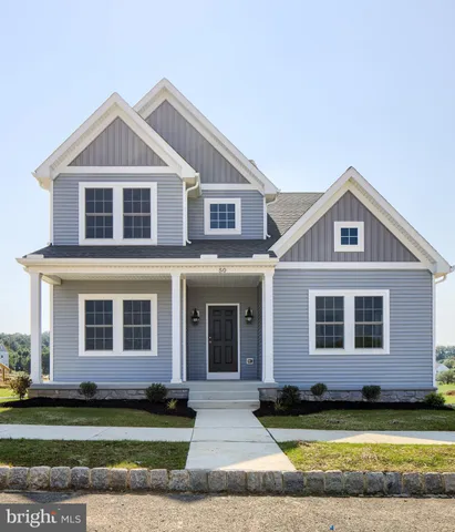 a view of a yard in front of a house