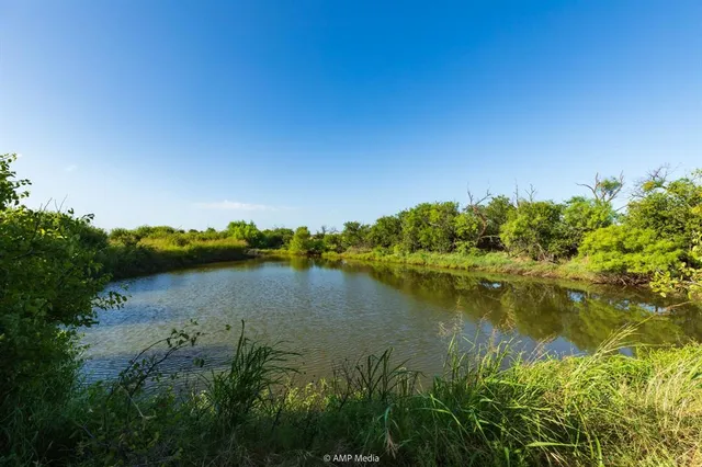 a view of lake background with houses