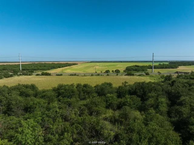 a view of lake with green space