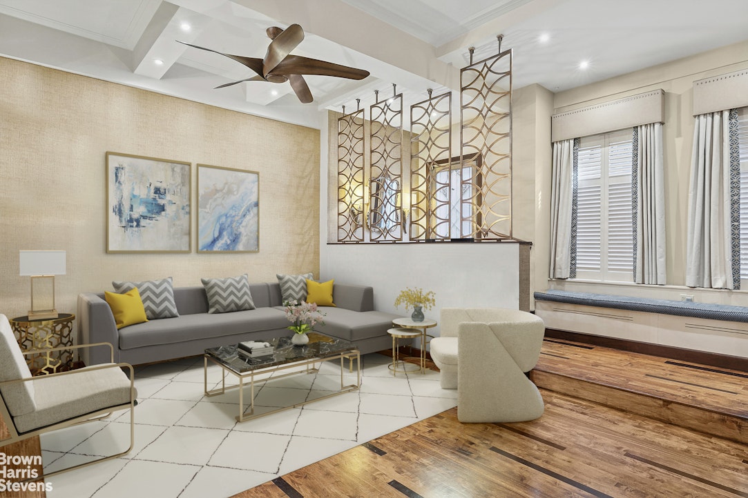 a living room with furniture and a window