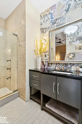 a bathroom with a sink and a mirror