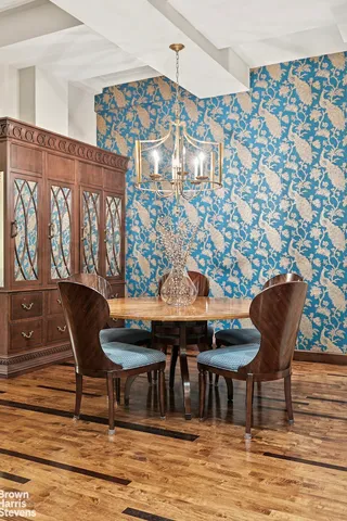 a view of a living room and bathroom with a couch