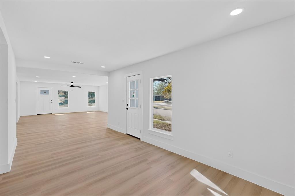 2219 Wilbur Street Dallas, TX 75224 - Photo 13 of 37 a view of empty room with wooden floor