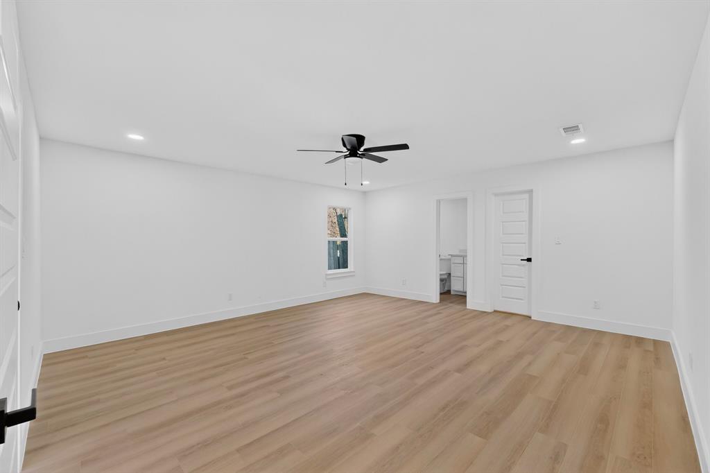 2219 Wilbur Street Dallas, TX 75224 - Photo 19 of 37 a view of empty room with wooden floor