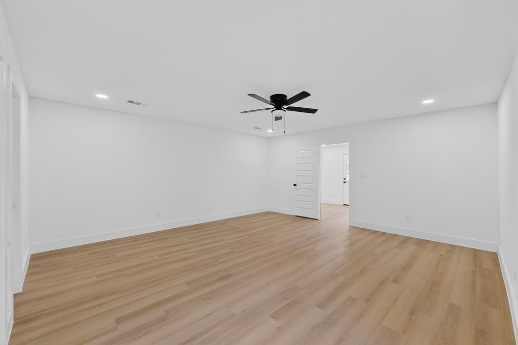 2219 Wilbur Street Dallas, TX 75224 - Photo 21 of 37 wooden floor in an empty room