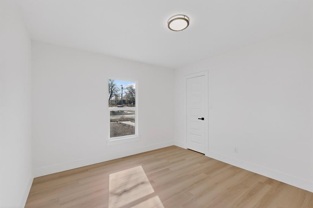2219 Wilbur Street Dallas, TX 75224 - Photo 25 of 37 a view of a room that has a window in it