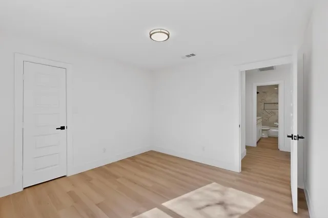 a view of a room that has a window in it