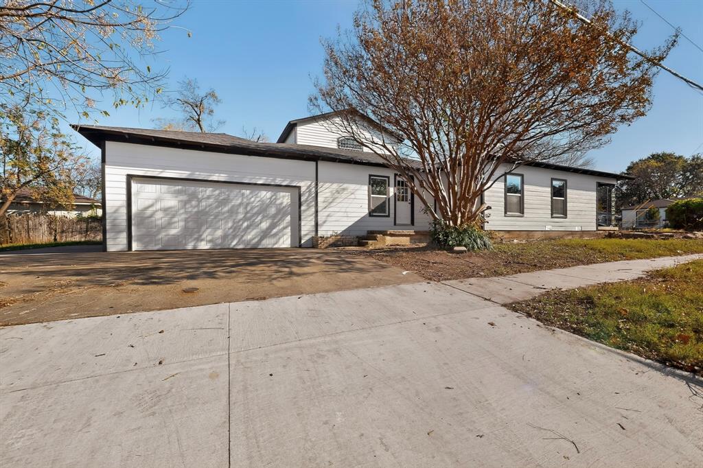 2219 Wilbur Street Dallas, TX 75224 - Photo 35 of 37 a view of a house with a snow in front of yard