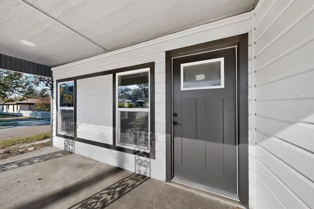 a bathroom with a tub and shower