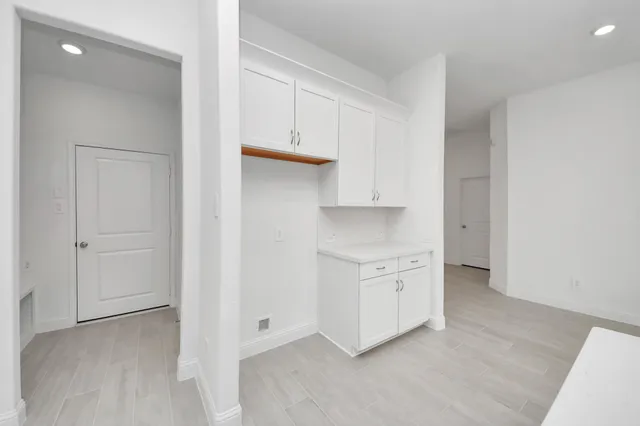 a view of an house with backyard space and garden