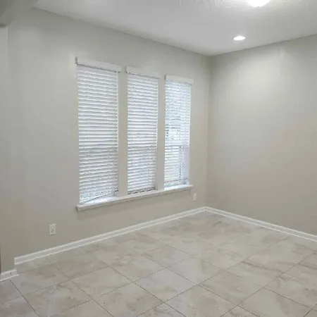 an empty room with a window