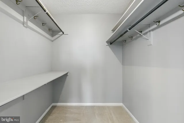 a view of a room with racks on the wall