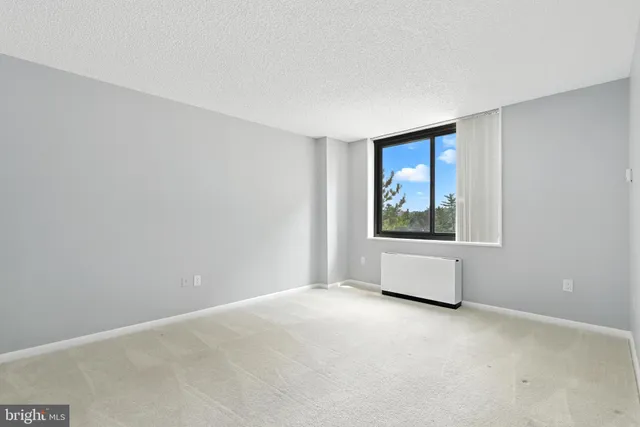 a view of an empty room with window