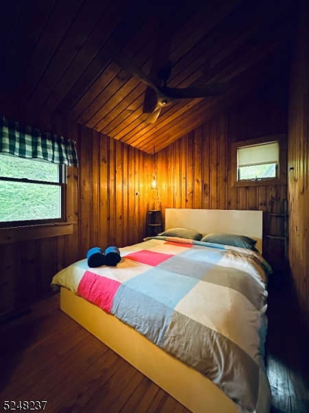 639 Canistear Road Vernon, NJ 07422 - Photo 13 of 23 a bed sitting in a spacious bedroom next to a window