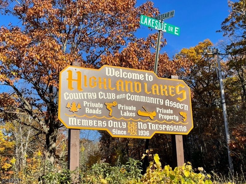 639 Canistear Road Vernon, NJ 07422 - Photo 19 of 23 a sign on the side of a building