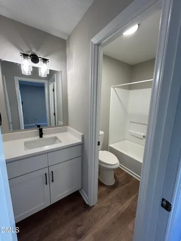 a bathroom with a sink and a tub