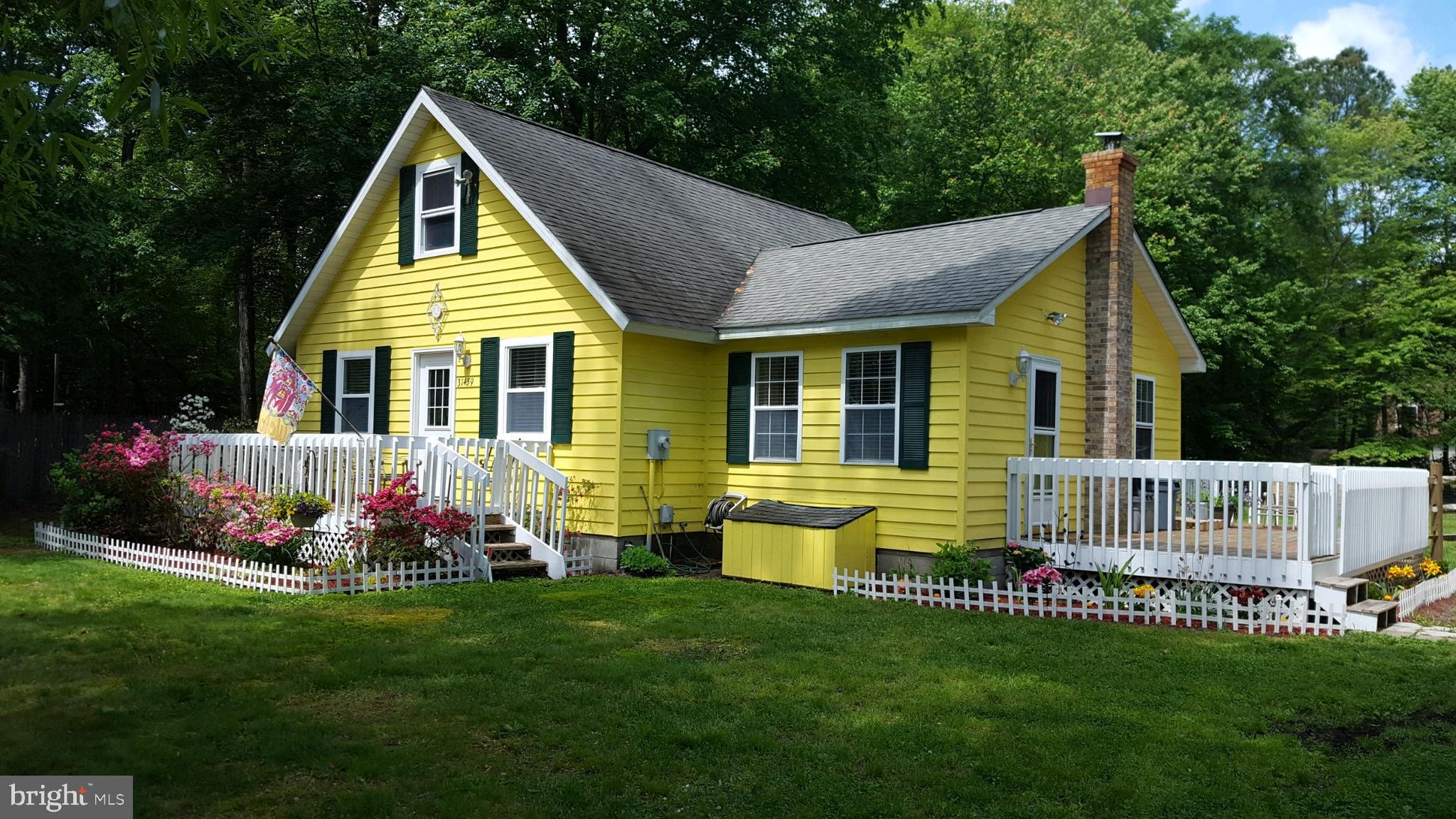 31459 Railway Road Ocean View, DE 19970 - Photo 1 of 37 front of home in the Spring