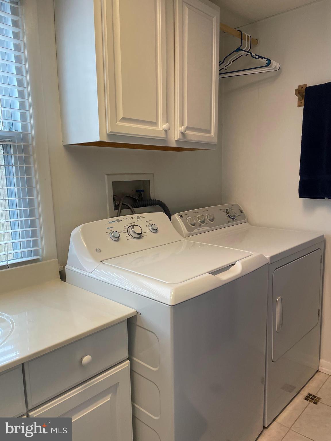 31459 Railway Road Ocean View, DE 19970 - Photo 21 of 37 laundry area in first floor full bath