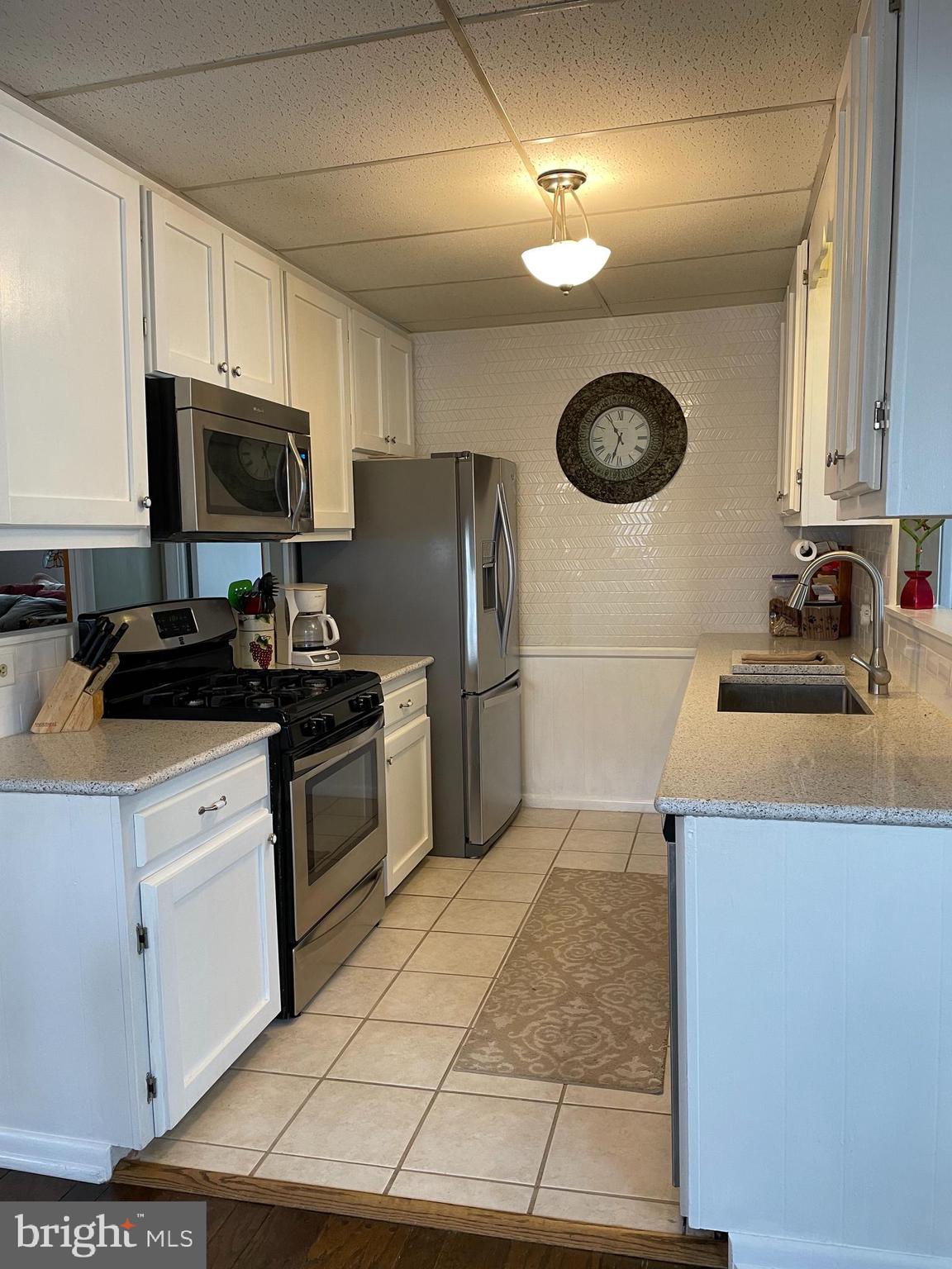 31459 Railway Road Ocean View, DE 19970 - Photo 5 of 37 renovated kitchen with SS appliances