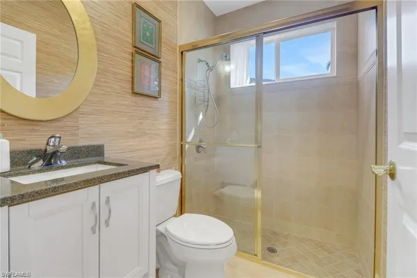 a utility room with a sink a washer and dryer
