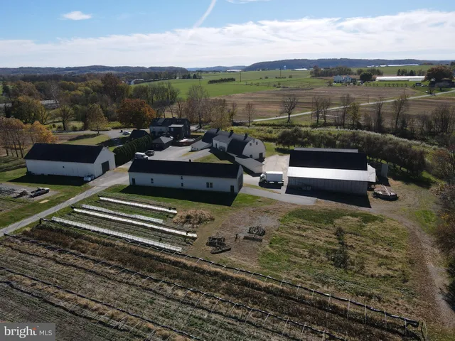 an aerial view of a city with ocean view