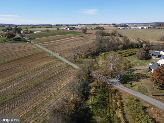 a view of a town with an ocean view