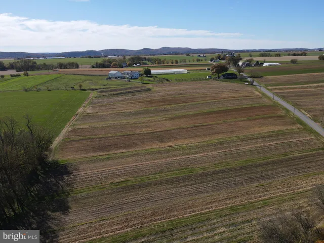 a view of a city with an ocean