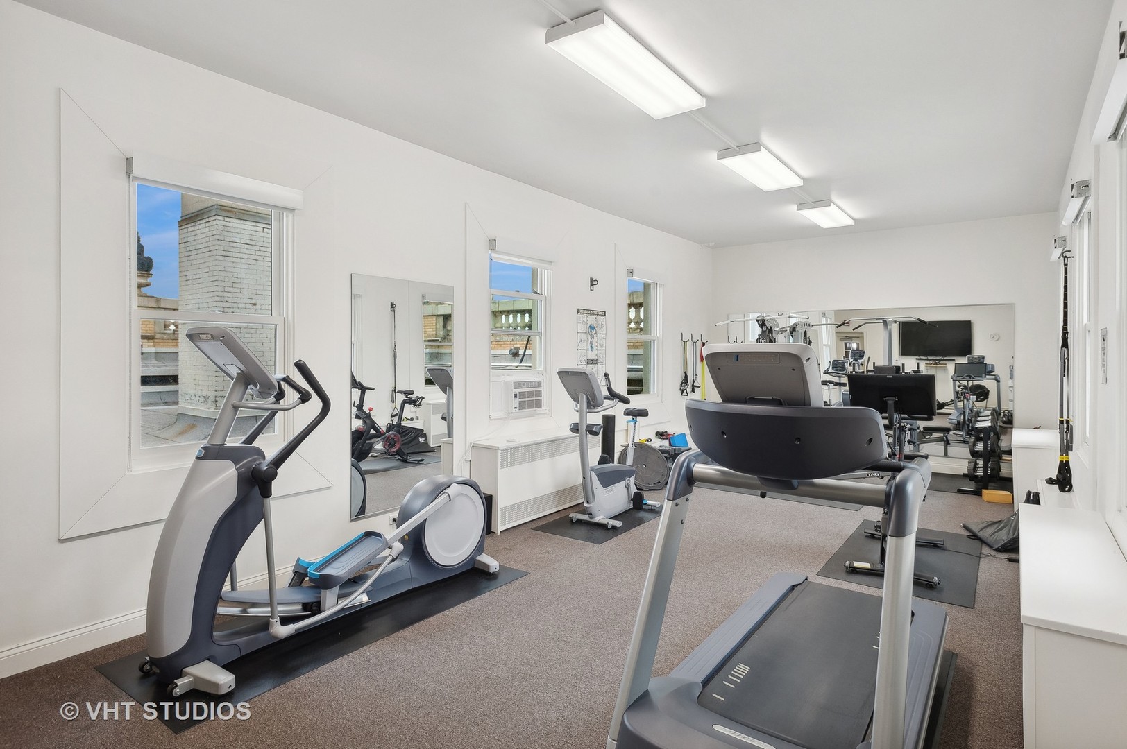 1550 North State Parkway, Unit 501 Chicago, IL 60610 - Photo 20 of 20 a view of a room with gym equipment