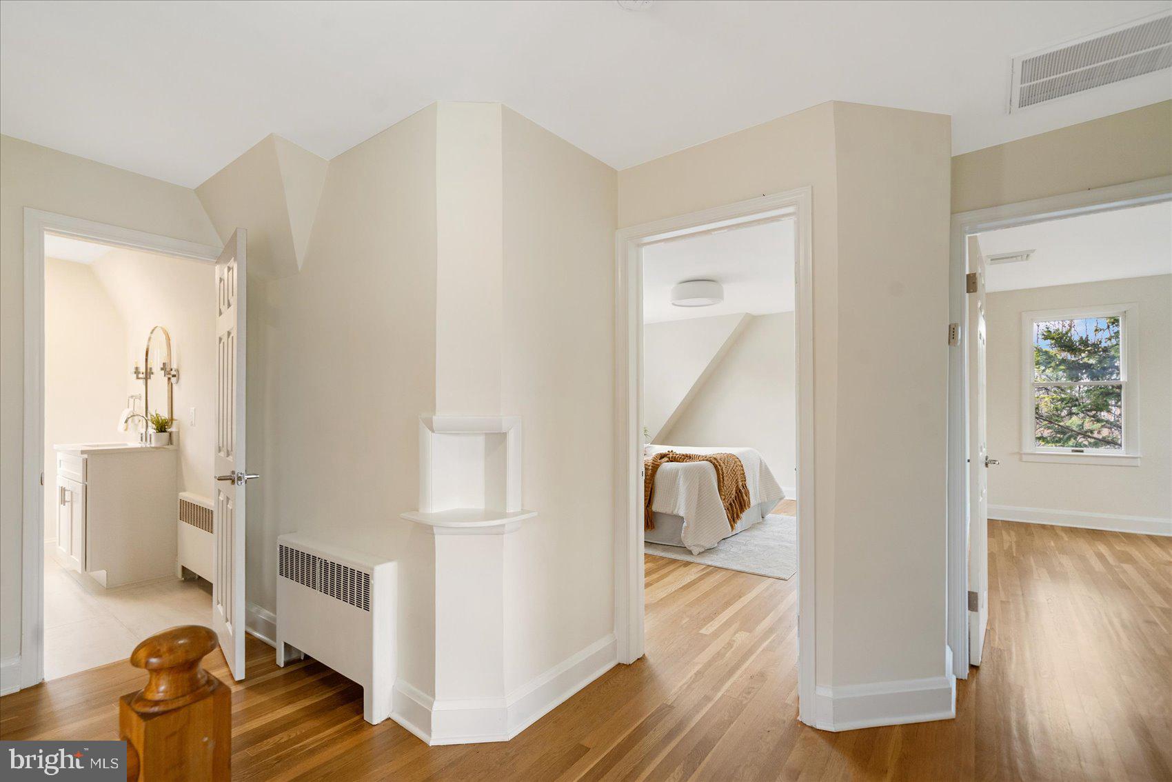 500 Wilton Road Baltimore, MD 21286 - Photo 25 of 57 a view of a livingroom with wooden floor and a ceiling fan
