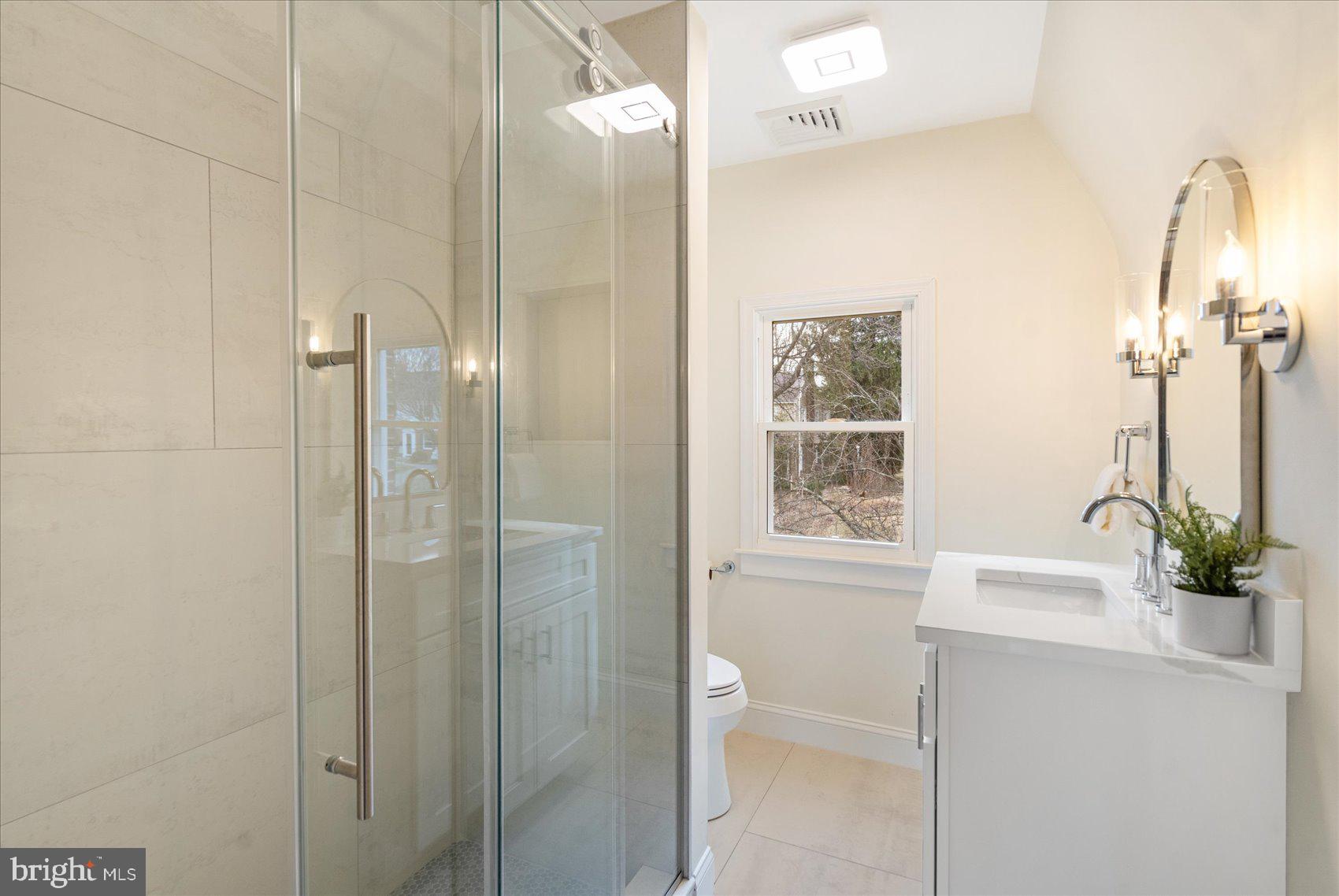 500 Wilton Road Baltimore, MD 21286 - Photo 27 of 57 a bathroom with a sink a toilet and shower
