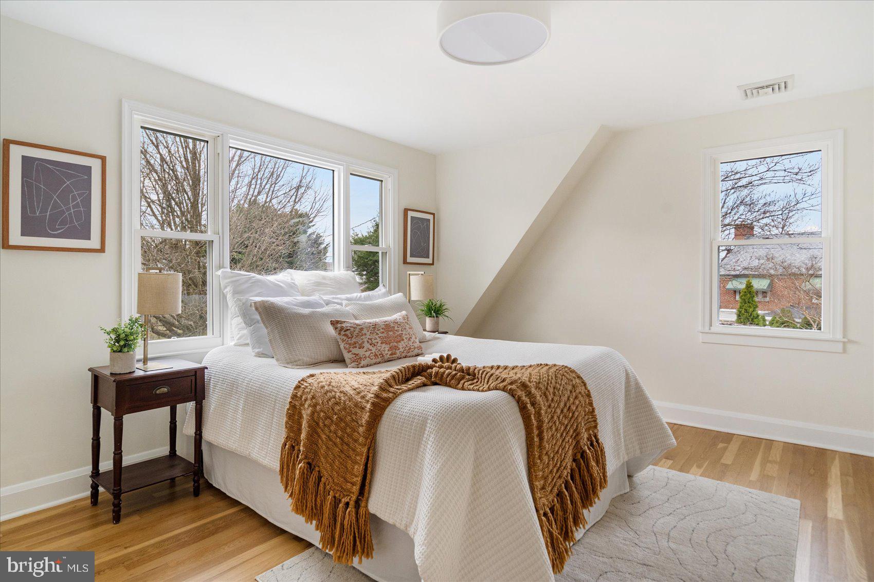 500 Wilton Road Baltimore, MD 21286 - Photo 28 of 57 a bed sitting in a bedroom next to a window