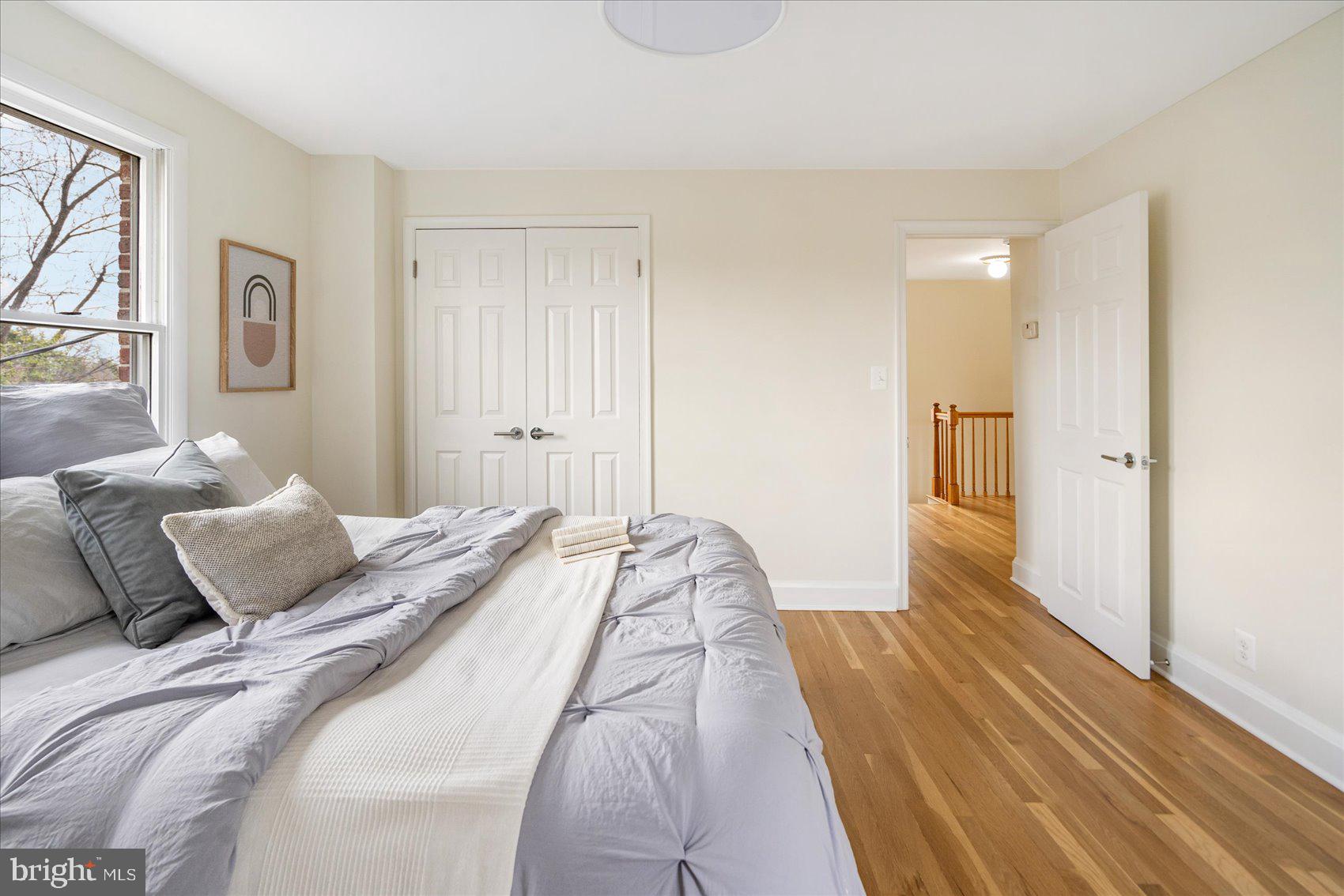 500 Wilton Road Baltimore, MD 21286 - Photo 36 of 57 a bedroom with a bed and a painting on the wall