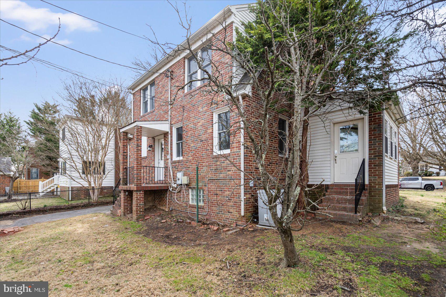 500 Wilton Road Baltimore, MD 21286 - Photo 54 of 57 a front view of a house with a yard