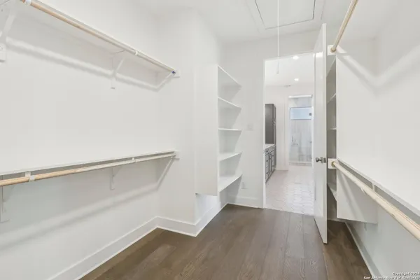 a view of an empty walk in closet