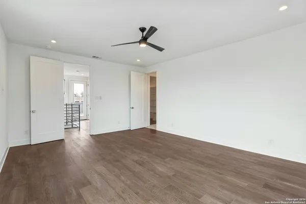 a living room with furniture potted plant and a window