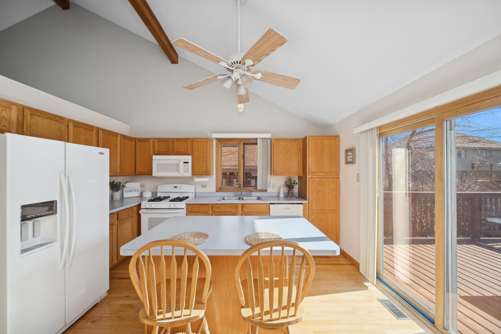 5309 Dixie Drive Alsip, IL 60803 - Photo 12 of 36 a large kitchen with a large window and stainless steel appliances