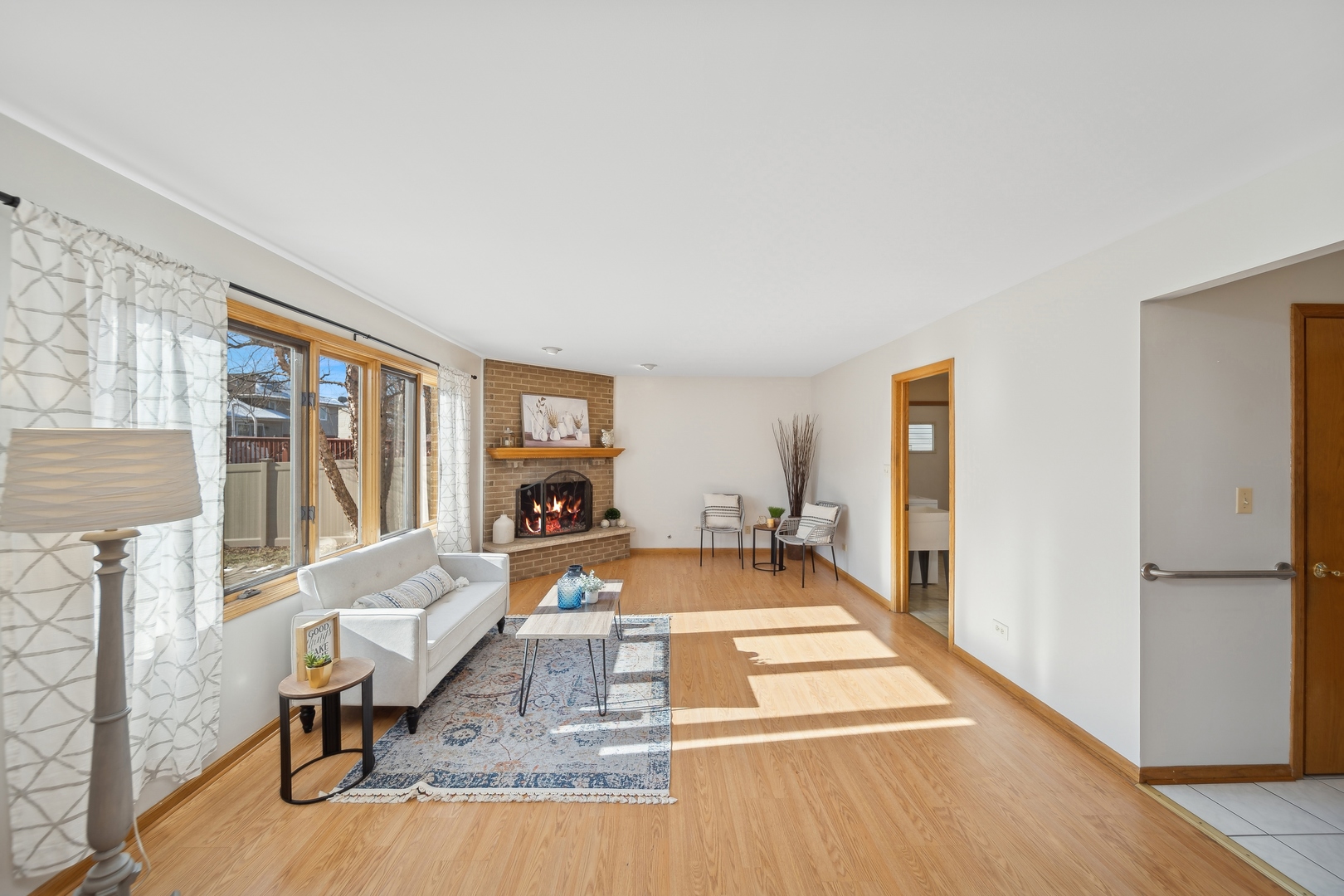 5309 Dixie Drive Alsip, IL 60803 - Photo 15 of 36 a living room with a couch and a table with wooden floor