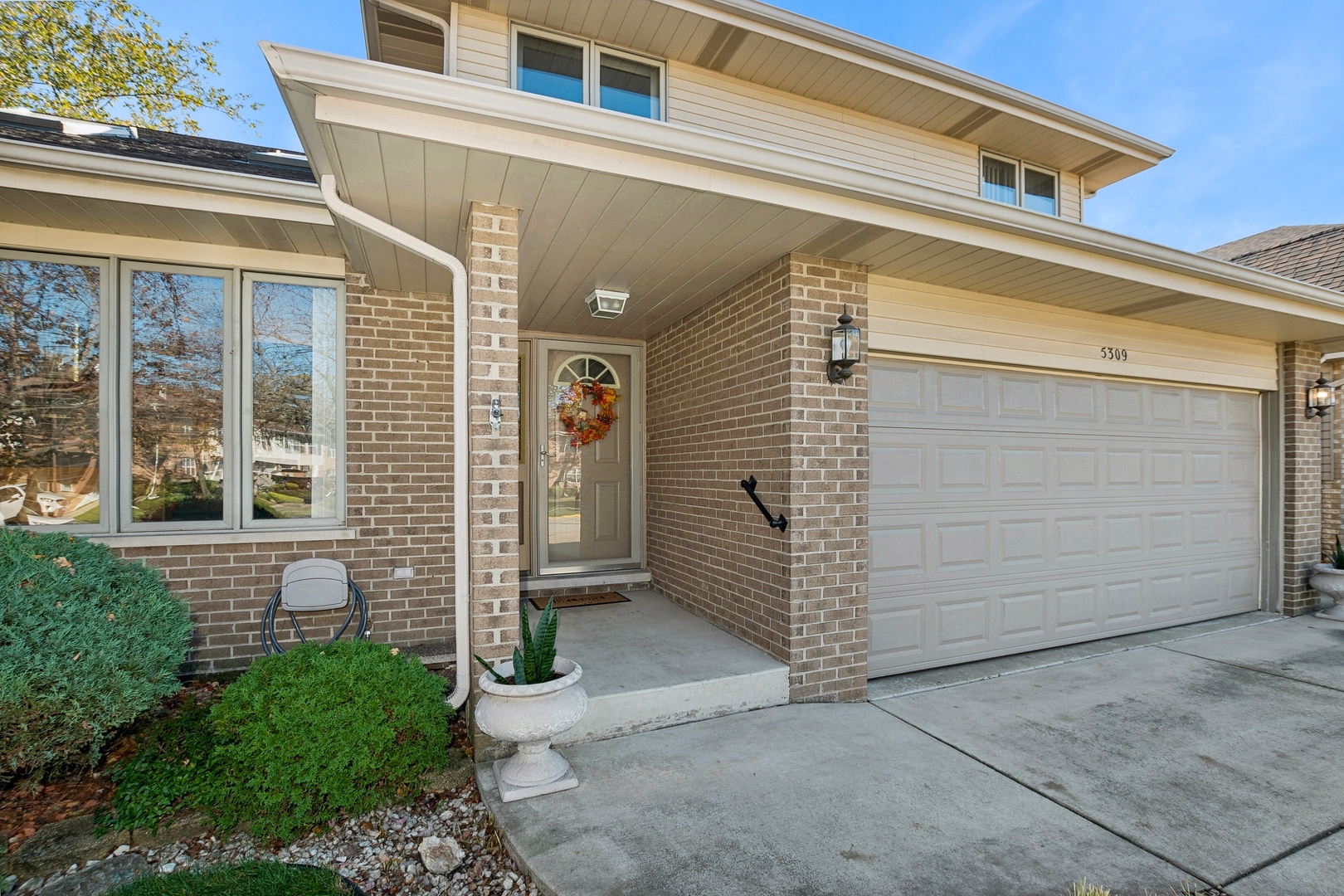 5309 Dixie Drive Alsip, IL 60803 - Photo 2 of 36 a view of a house with an door and garage