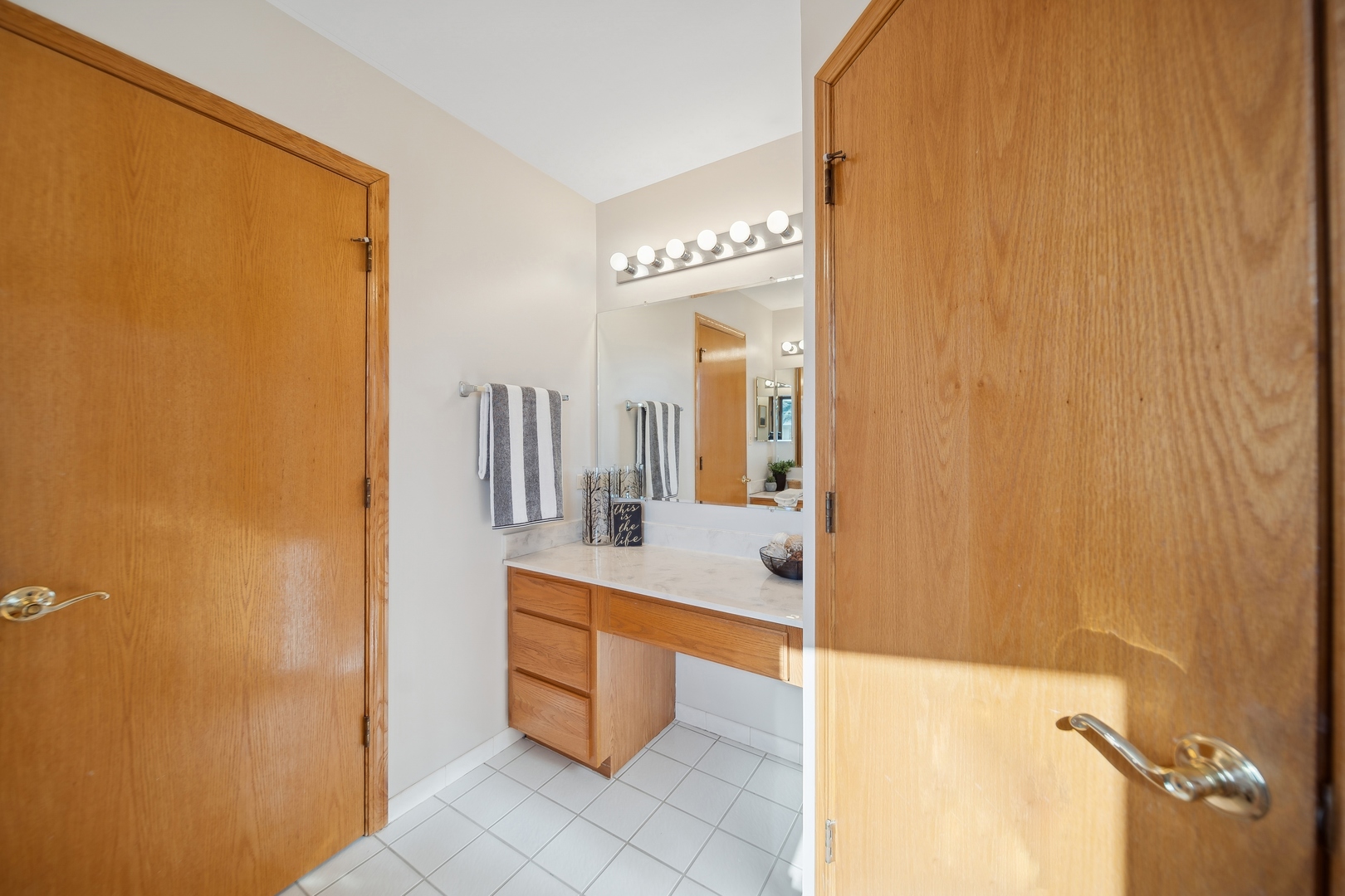 5309 Dixie Drive Alsip, IL 60803 - Photo 22 of 36 a view of bathroom with a sink and mirror